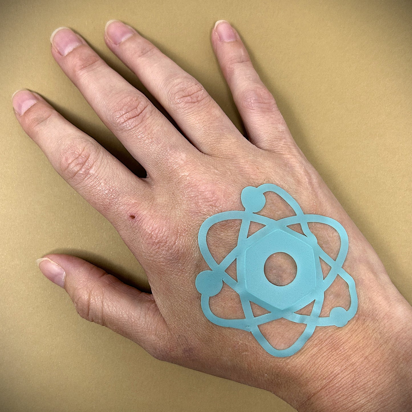 Tanning Sticker Atom Cutout
